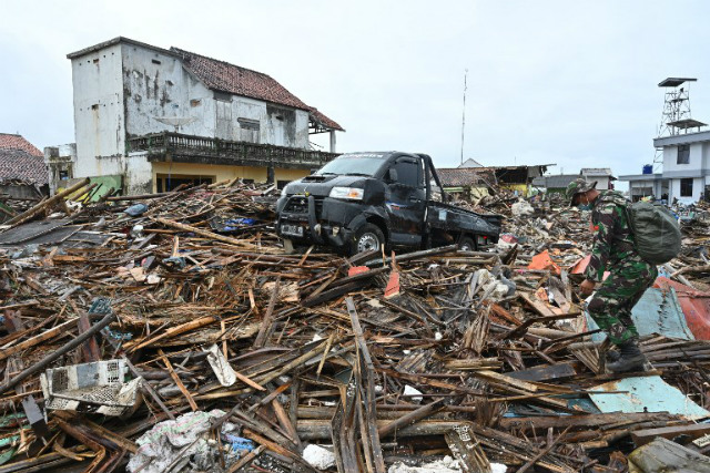 'Run to the hills': Tsunami fears spark chaos in Indonesia town